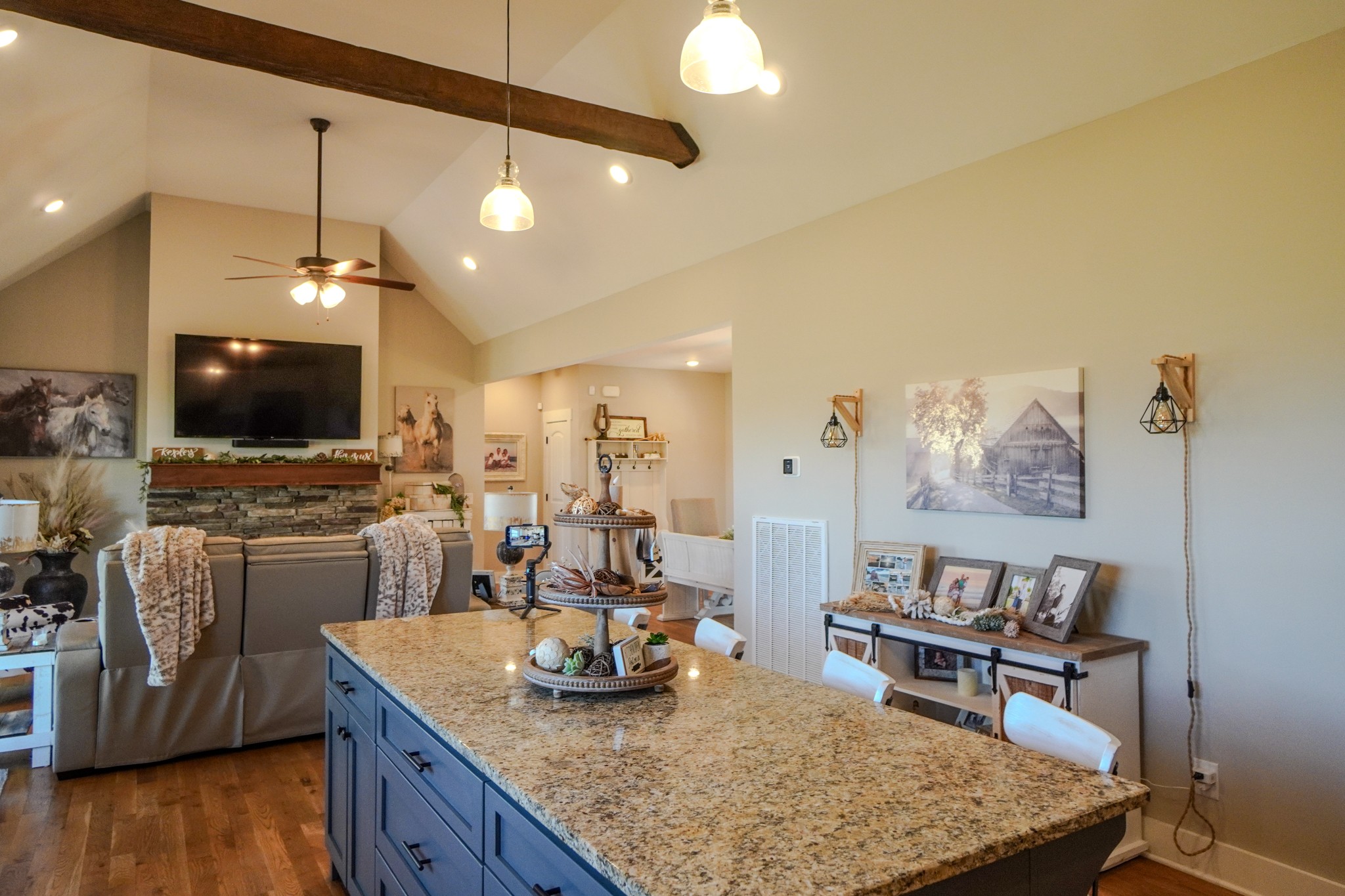 529 Clearview Road Cottontown, TN 37048 - Photo 16 of 64 a kitchen with stainless steel appliances granite countertop a sink a stove and a wooden floors