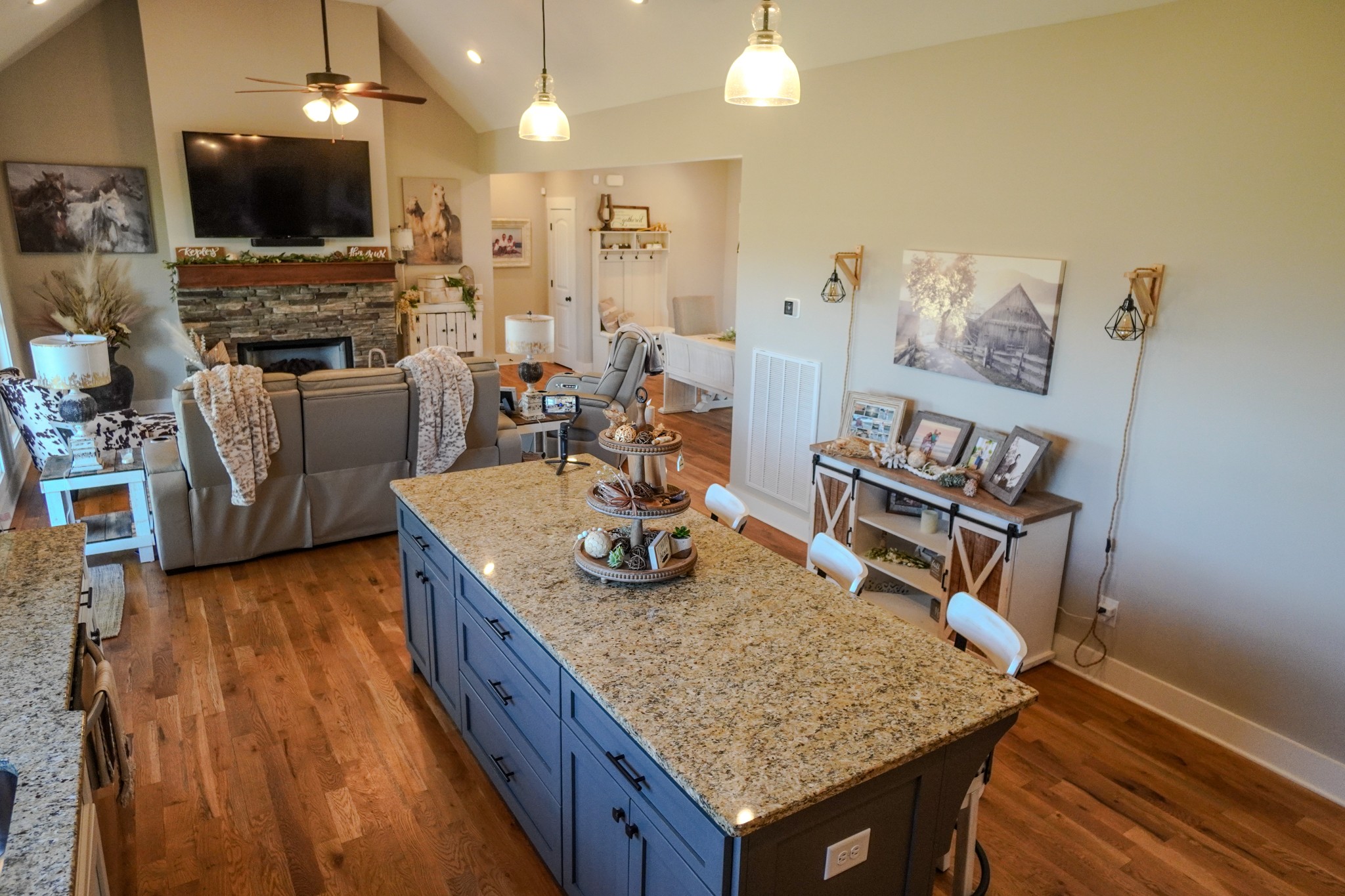 529 Clearview Road Cottontown, TN 37048 - Photo 17 of 64 a kitchen with stainless steel appliances granite countertop a stove and a wooden floor