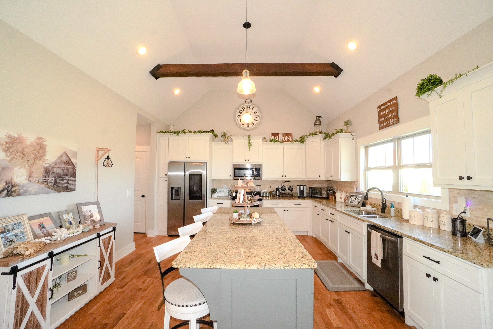 529 Clearview Road Cottontown, TN 37048 - Photo 21 of 64 a large kitchen with kitchen island a large counter space a sink stainless steel appliances and cabinets