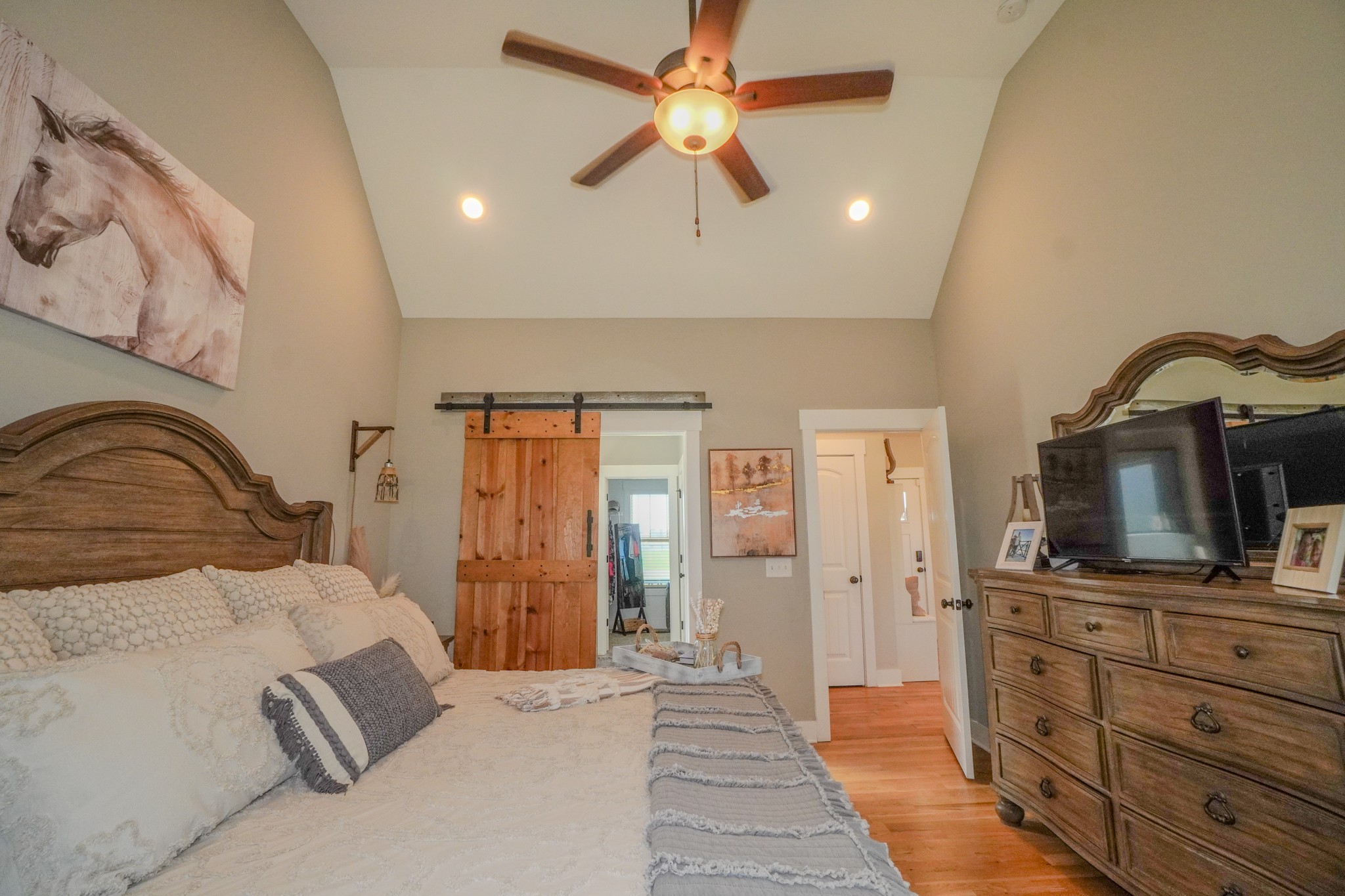 529 Clearview Road Cottontown, TN 37048 - Photo 25 of 64 a bedroom with a bed and a flat screen tv