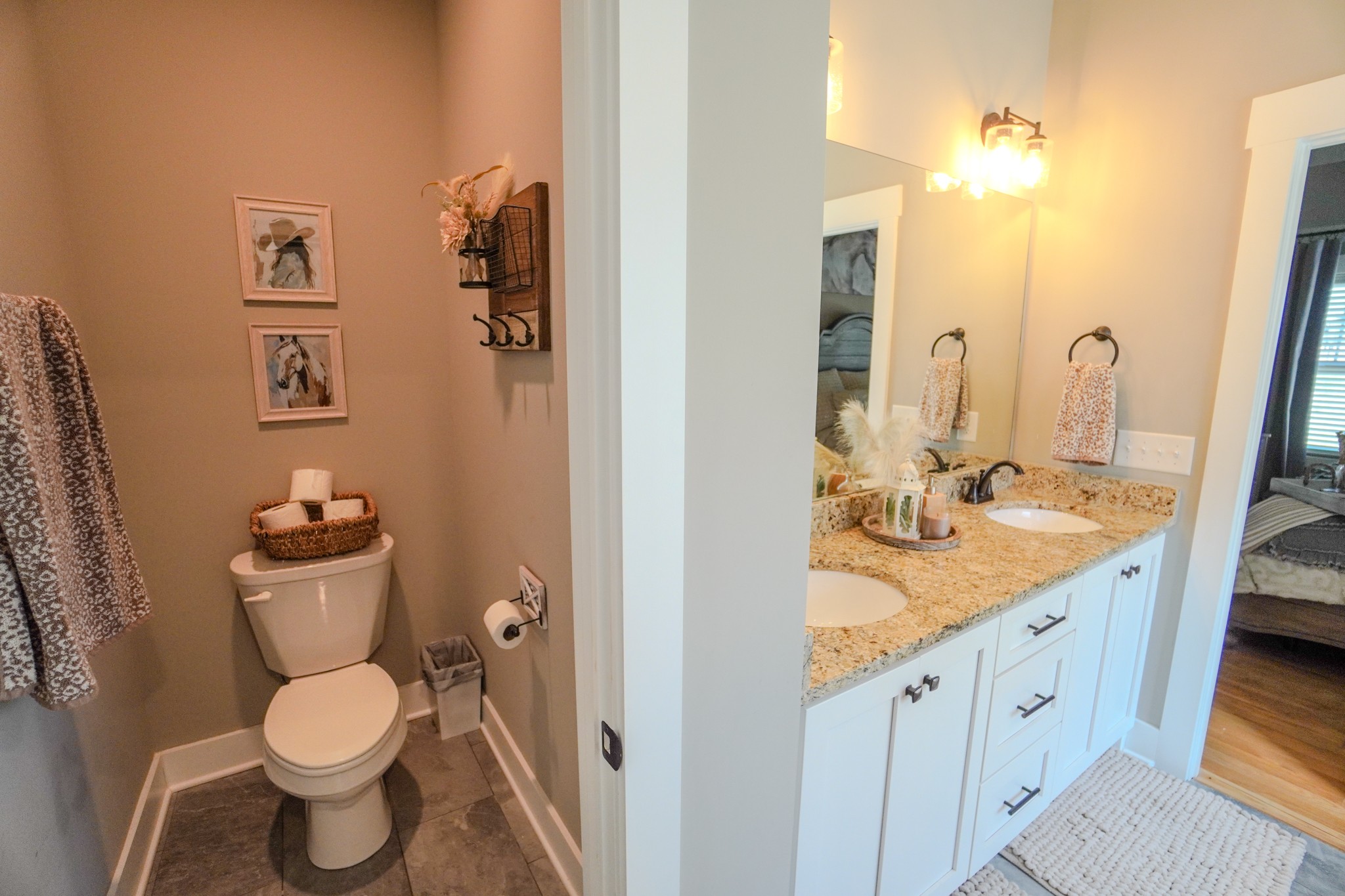 529 Clearview Road Cottontown, TN 37048 - Photo 27 of 64 a bathroom with a granite countertop toilet sink and mirror