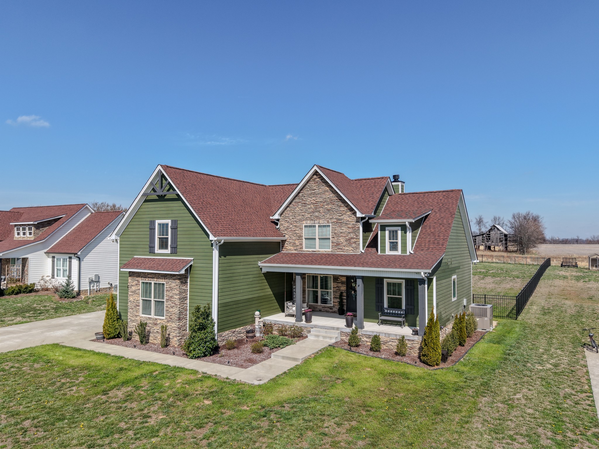 529 Clearview Road Cottontown, TN 37048 - Photo 60 of 64 a front view of a house with a yard table and chairs
