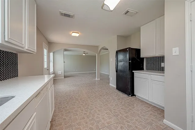 a view of a hallway with closet