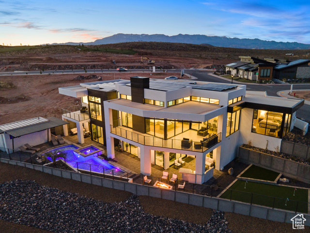 3558 South Cypress Road Hurricane, UT 84737 - Photo 46 of 57 Aerial view at dusk with a mountain view