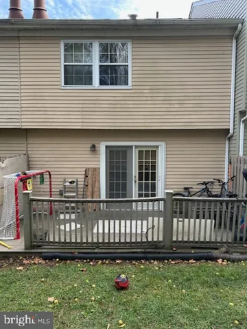 a view of deck with wooden floor and seating space