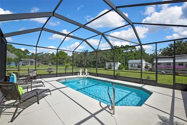 a building outdoor space with patio couches and dining table