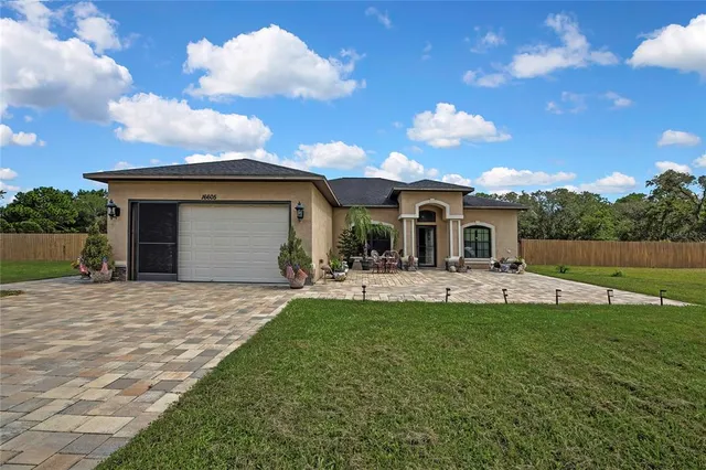 $599,900 | 16605 Diplomat Drive, Spring Hill, FL 34610