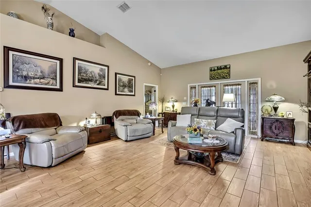 a living room with furniture and a rug