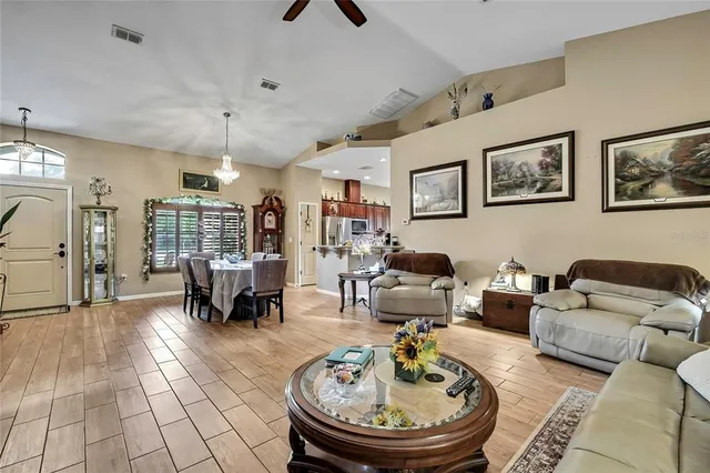 a living room with furniture and a table