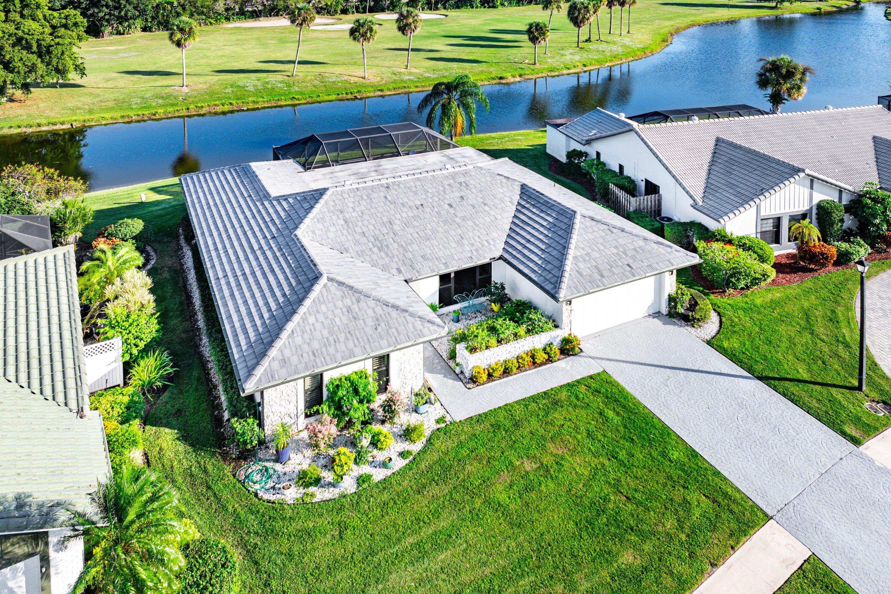 10174 Crosswind Road Boca Raton, FL 33498 - Photo 32 of 45 a view of an outdoor sitting space