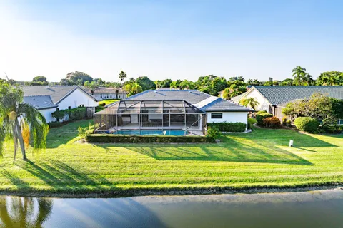 a aerial view of a house with a big yard