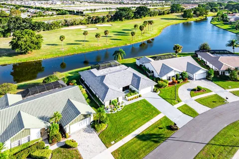 an aerial view of a pool patio patio and outdoor seating