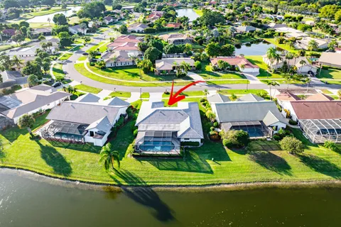 a view of houses with swimming pool and outdoor space