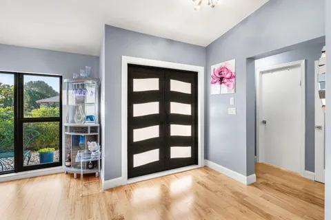 a view of livingroom with furniture and floor to ceiling window