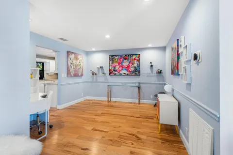 a room with furniture and a flat screen tv