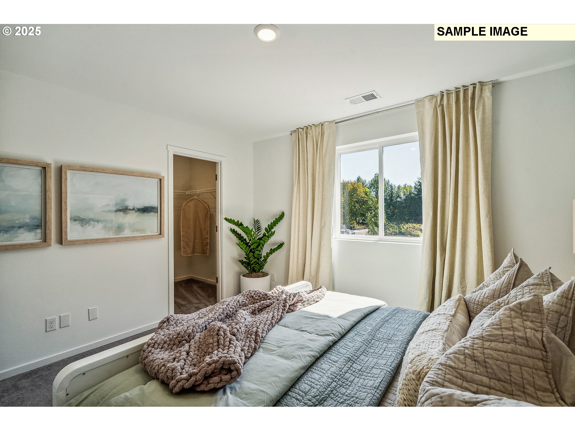 5791 Durst Street Eugene, OR 97402 - Photo 12 of 25 a bedroom with a bed and a window