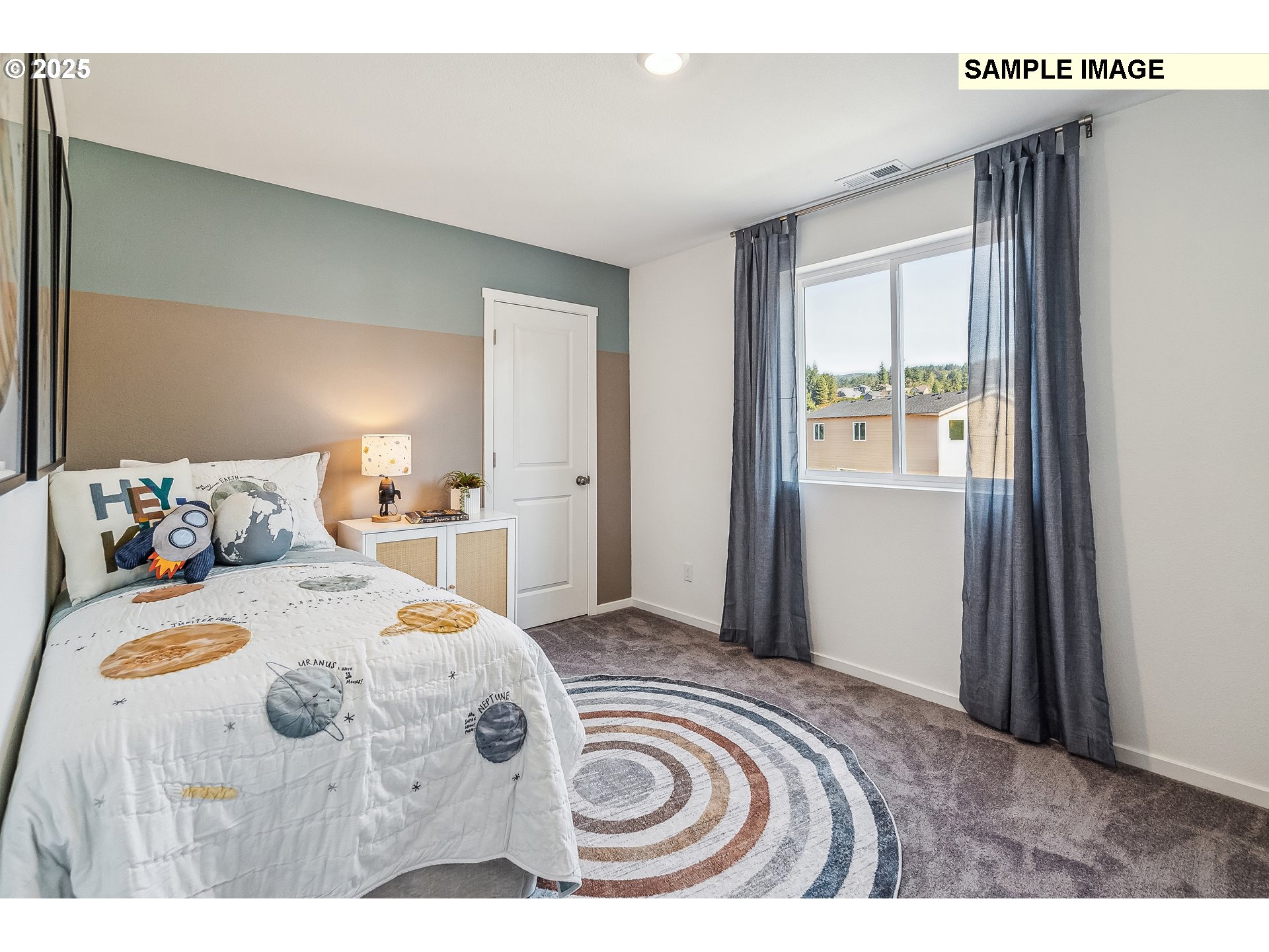 5791 Durst Street Eugene, OR 97402 - Photo 15 of 25 a bedroom with a bed and a window