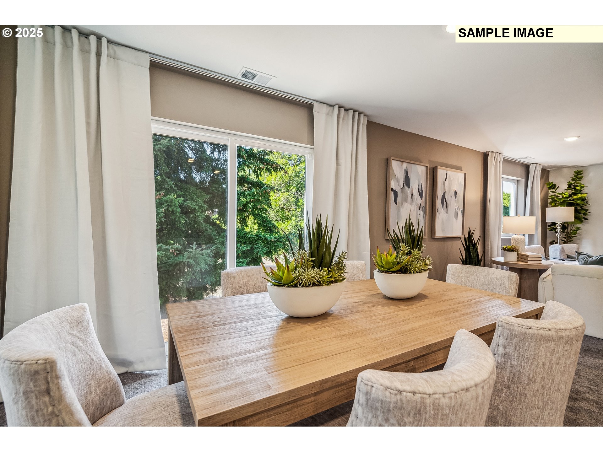 5791 Durst Street Eugene, OR 97402 - Photo 6 of 25 a view of a dining room with a table and chairs