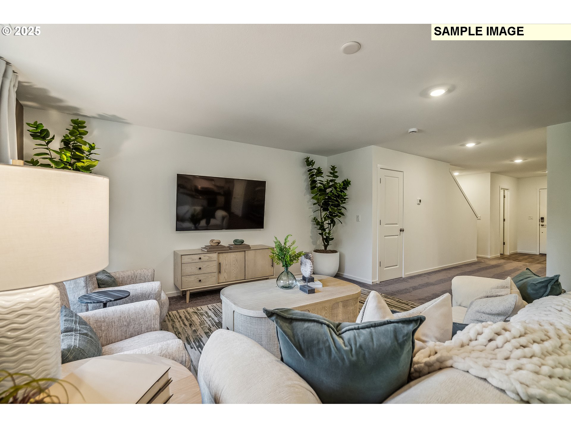 5791 Durst Street Eugene, OR 97402 - Photo 8 of 25 a living room with furniture and a flat screen tv