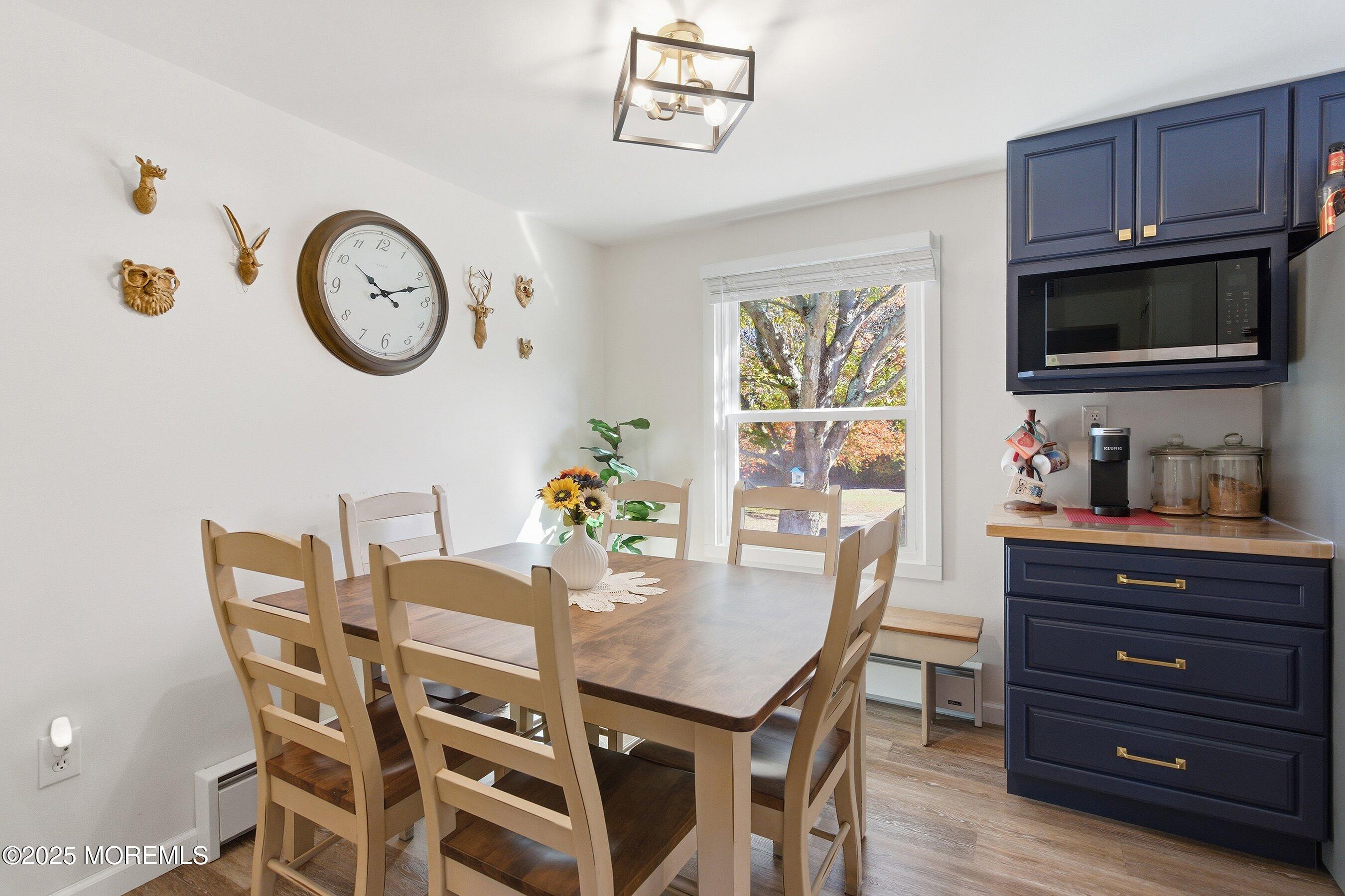 145 Cassville Road Jackson, NJ 08527 - Photo 14 of 35 a view of a dining room with furniture and a window