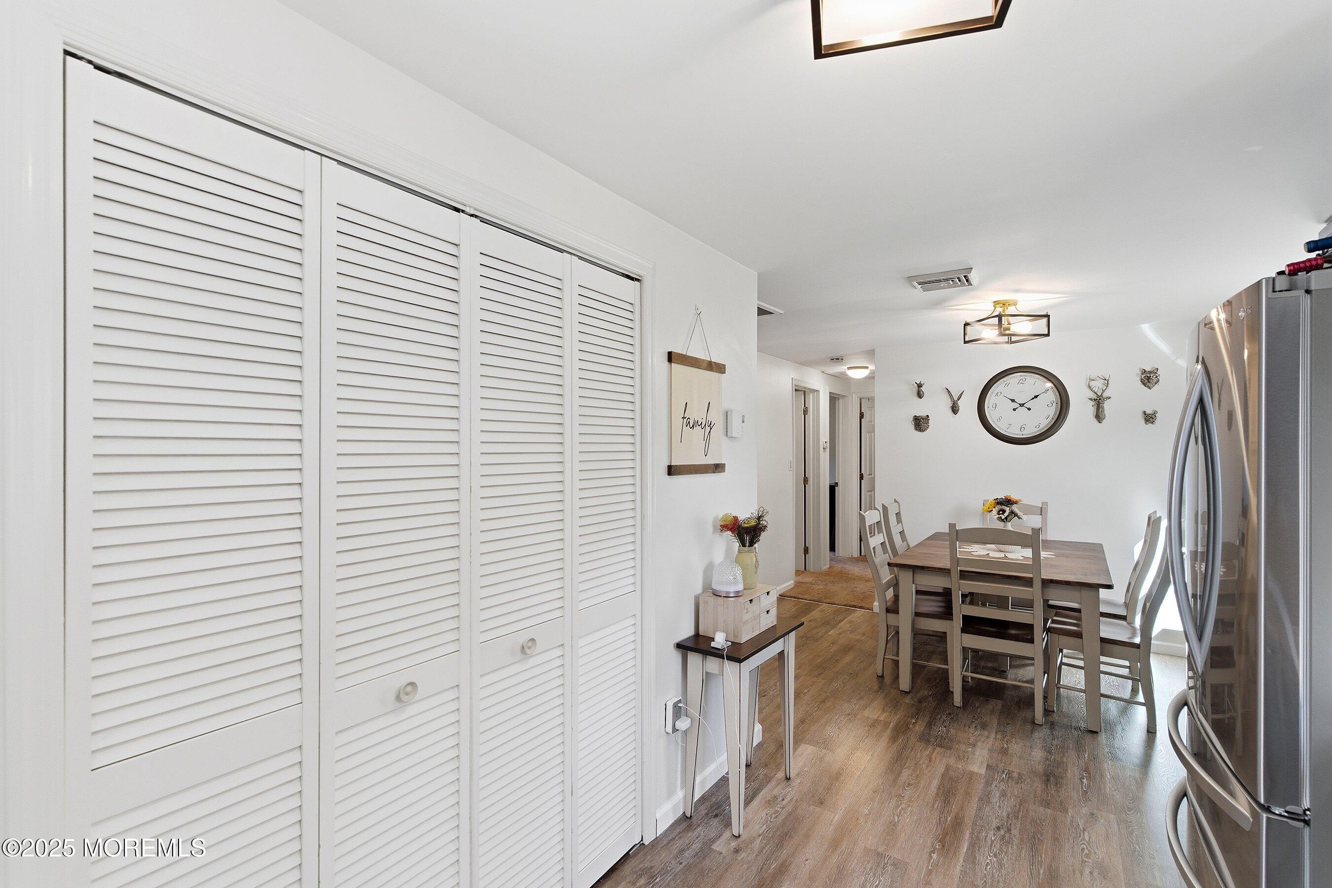 145 Cassville Road Jackson, NJ 08527 - Photo 19 of 35 a view of a room with chairs and wooden floor