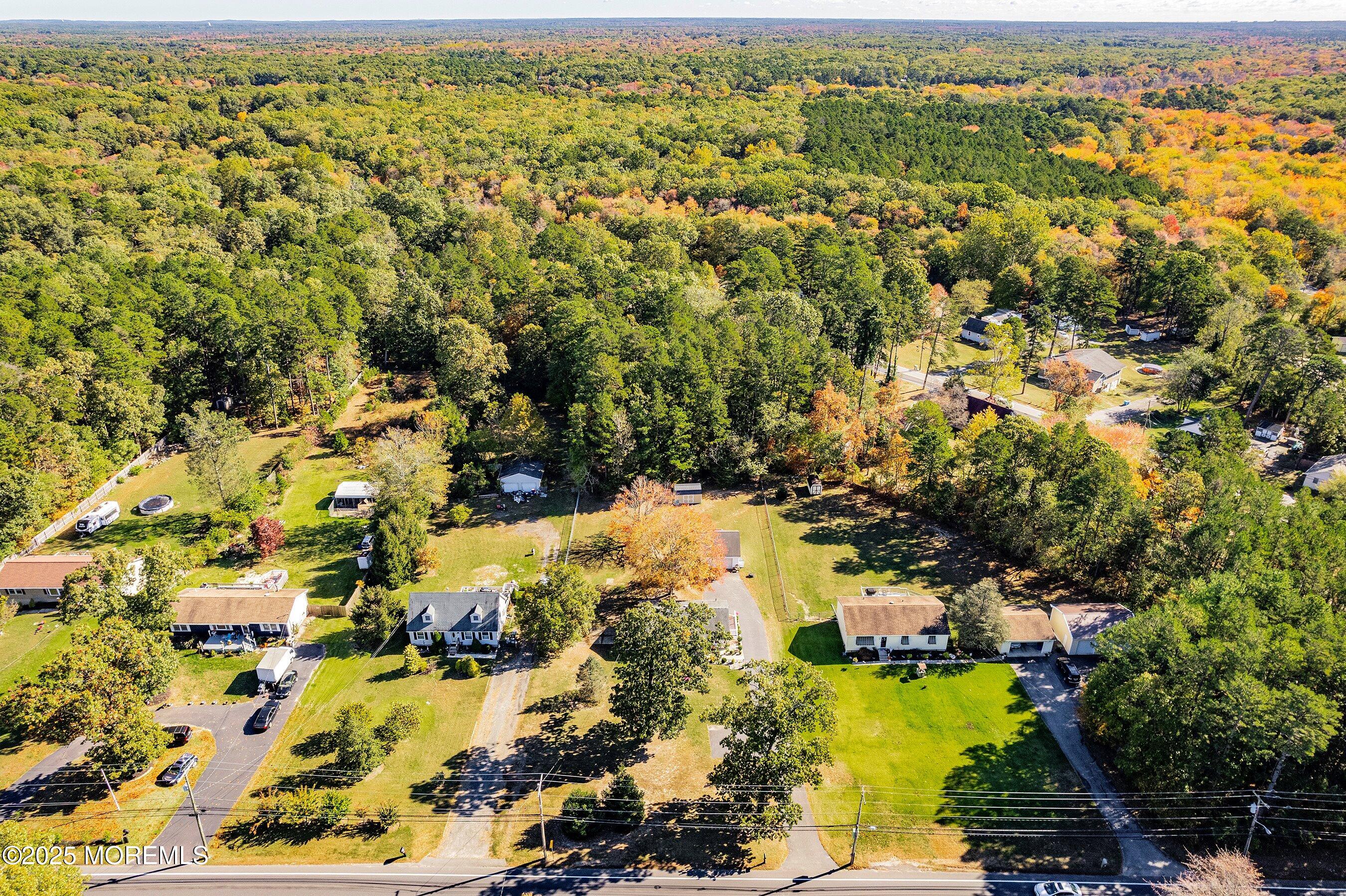 145 Cassville Road Jackson, NJ 08527 - Photo 2 of 35 an aerial view of residential houses with outdoor space