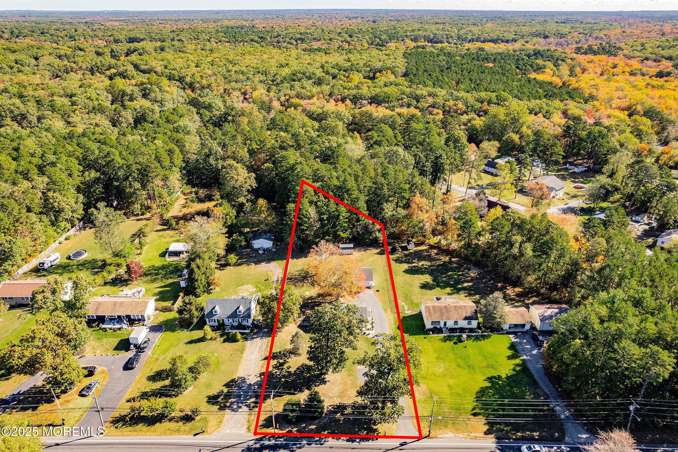 145 Cassville Road Jackson, NJ 08527 - Photo 3 of 35 an aerial view of residential houses with outdoor space
