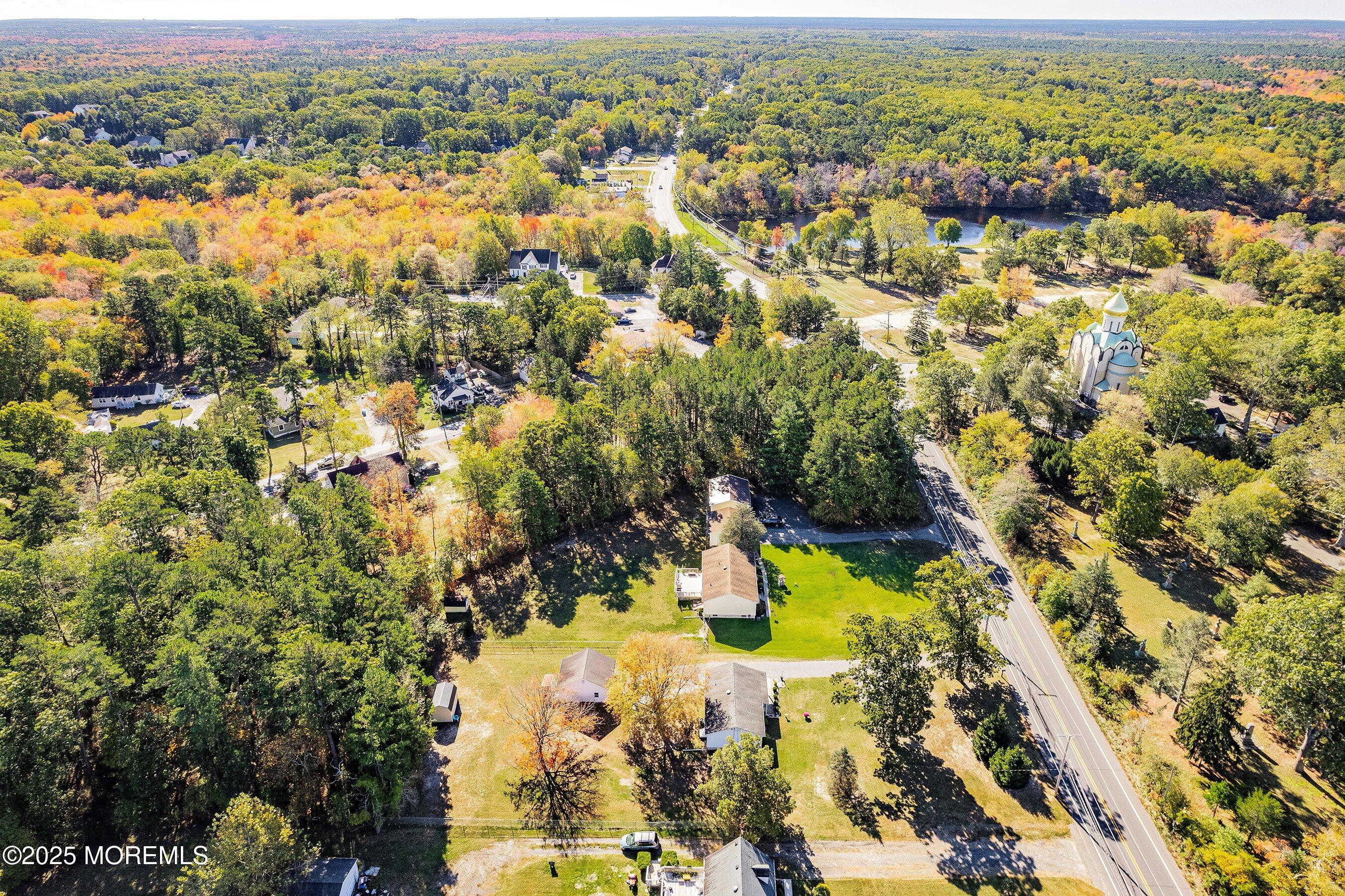 145 Cassville Road Jackson, NJ 08527 - Photo 31 of 35 an aerial view of residential houses with outdoor space