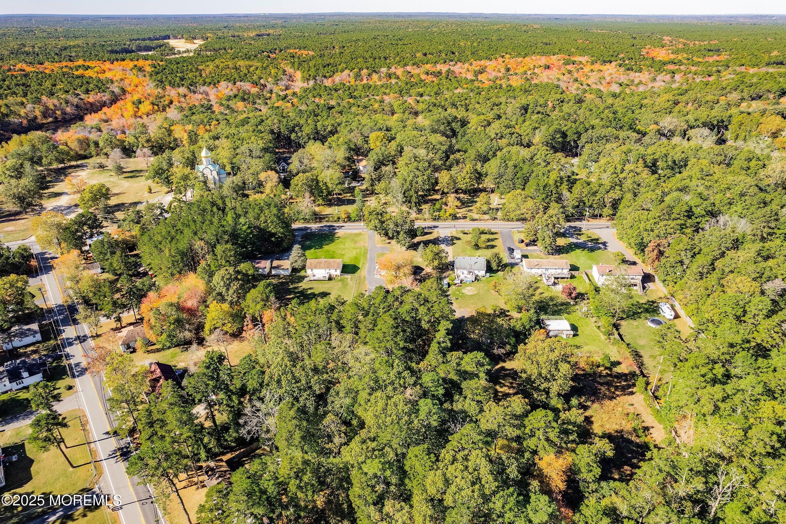145 Cassville Road Jackson, NJ 08527 - Photo 33 of 35 an aerial view of residential houses with outdoor space and trees