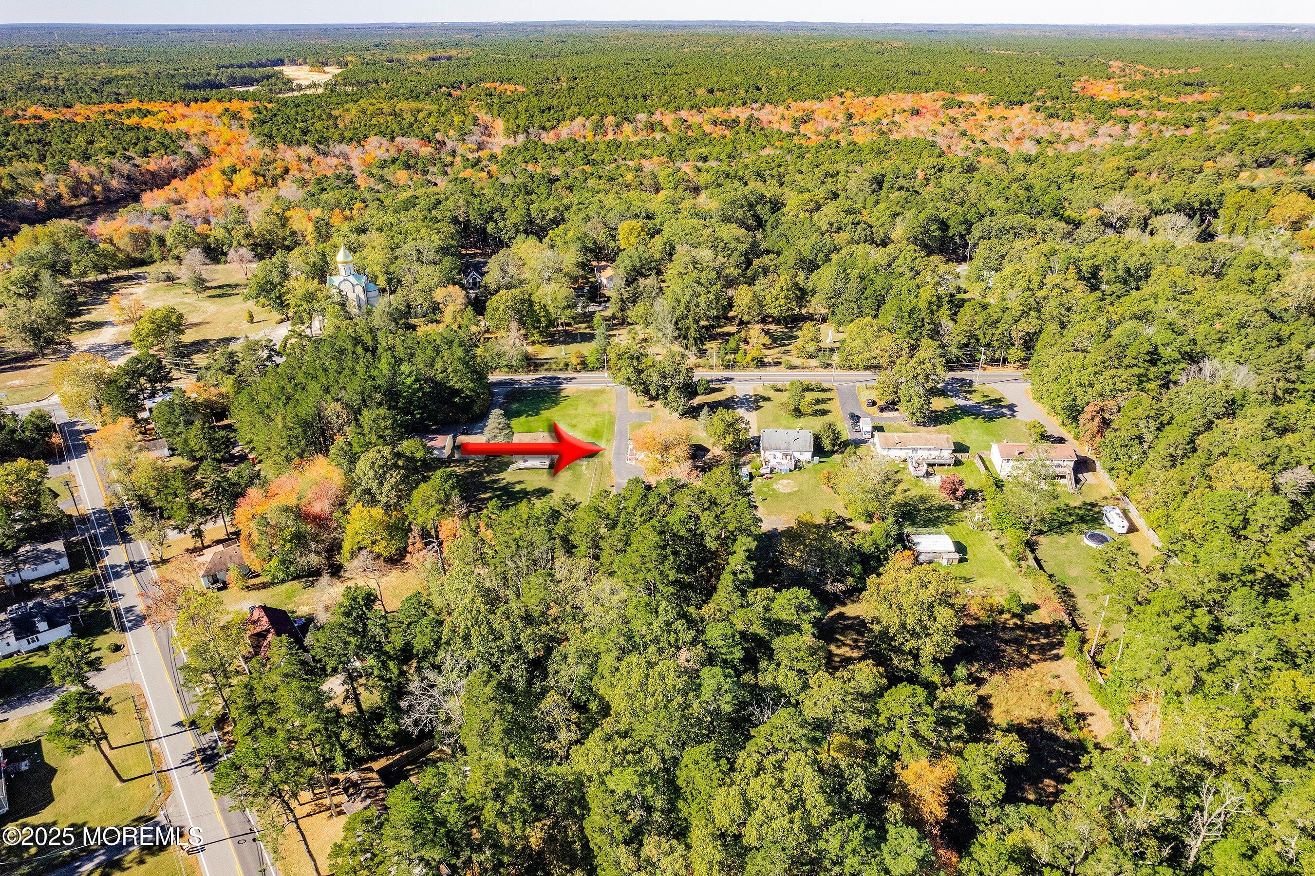 145 Cassville Road Jackson, NJ 08527 - Photo 34 of 35 an aerial view of residential houses with outdoor space and trees