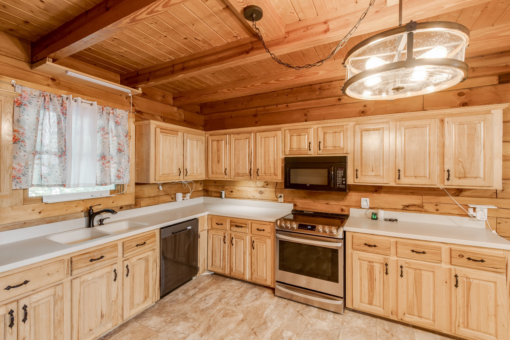 3585 Cooper Nicholson Road Pleasant View, TN 37146 - Photo 15 of 41 a kitchen with stainless steel appliances a stove sink and cabinets
