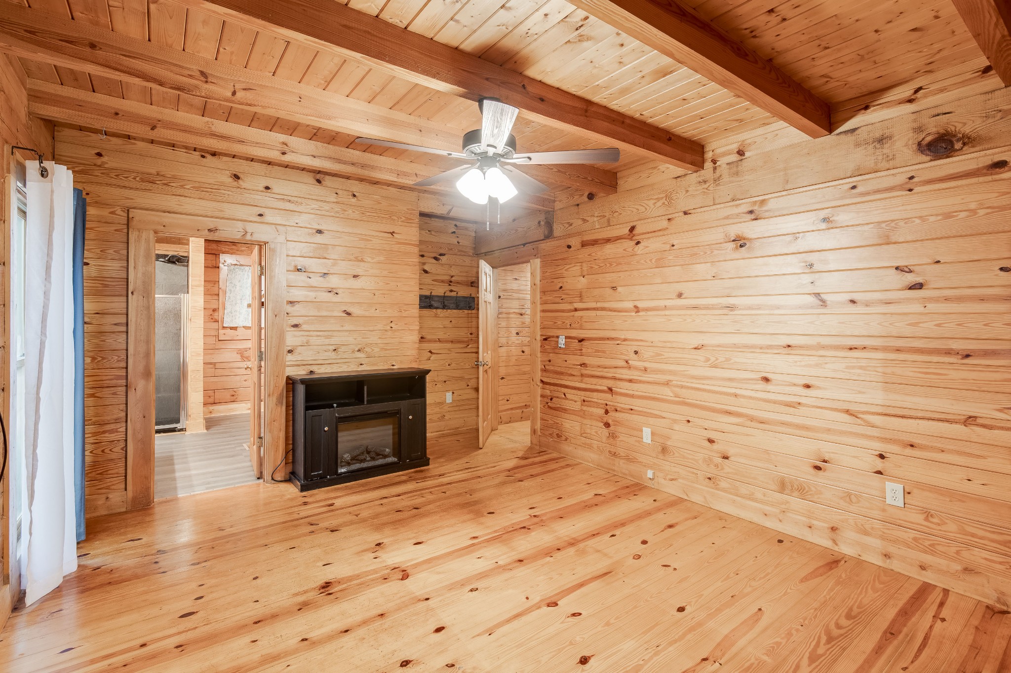 3585 Cooper Nicholson Road Pleasant View, TN 37146 - Photo 20 of 41 a view of empty room with wooden floor and fireplace
