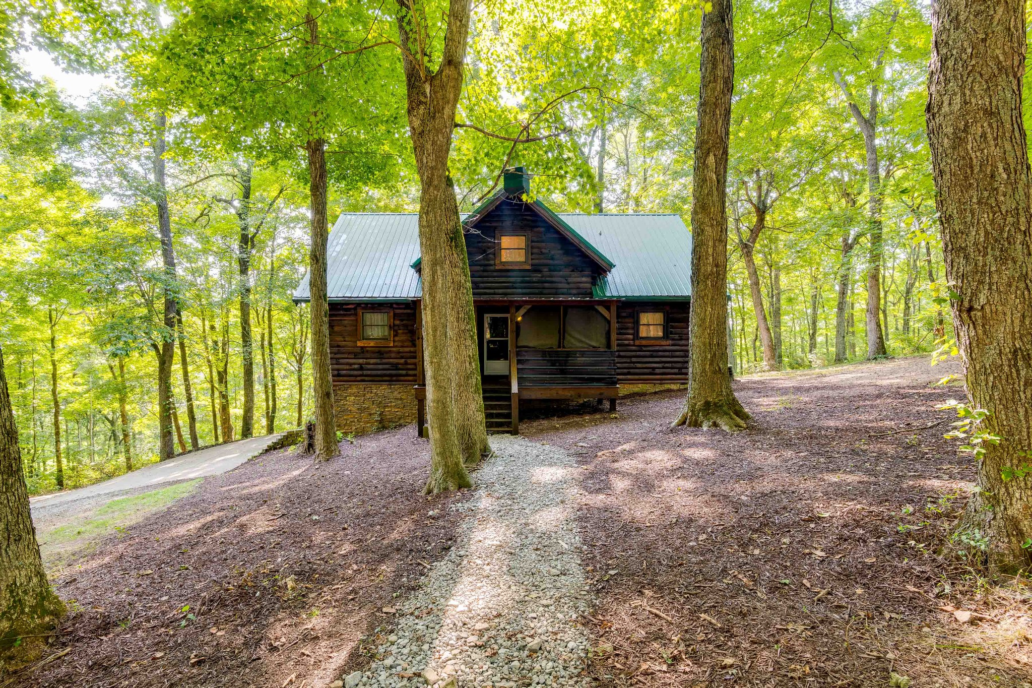 3585 Cooper Nicholson Road Pleasant View, TN 37146 - Photo 3 of 41 a view of a house with a tree in the forest