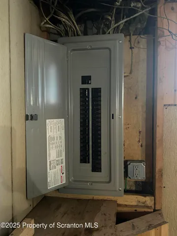 a view of a door and a window