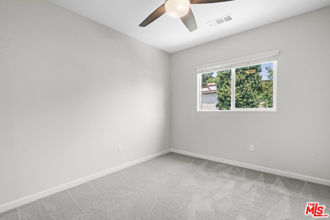 15603 Lilli Way Van Nuys, CA 91406 - Photo 9 of 15 an empty room with a window