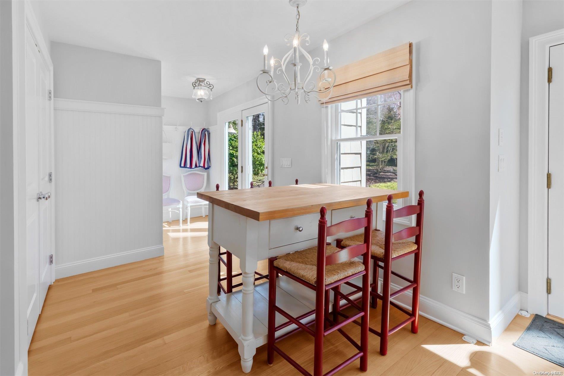 250 Wesland Road Southold, NY 11971 - Photo 12 of 29 a view of a dining room with furniture and window