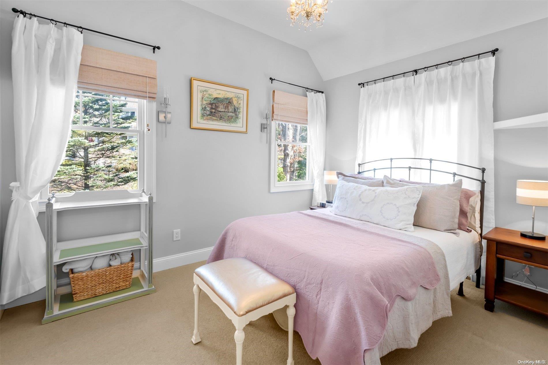 250 Wesland Road Southold, NY 11971 - Photo 23 of 29 a bedroom with a bed and a window