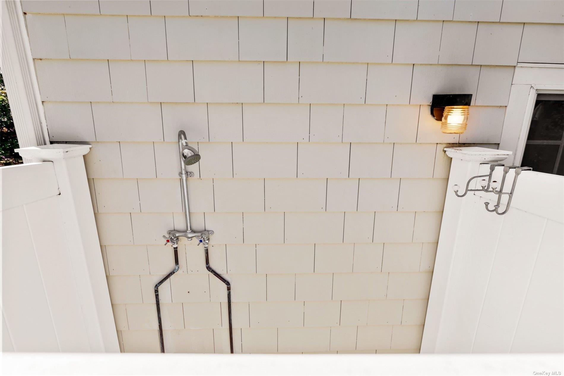 250 Wesland Road Southold, NY 11971 - Photo 6 of 29 a bathroom with a bathtub and shower