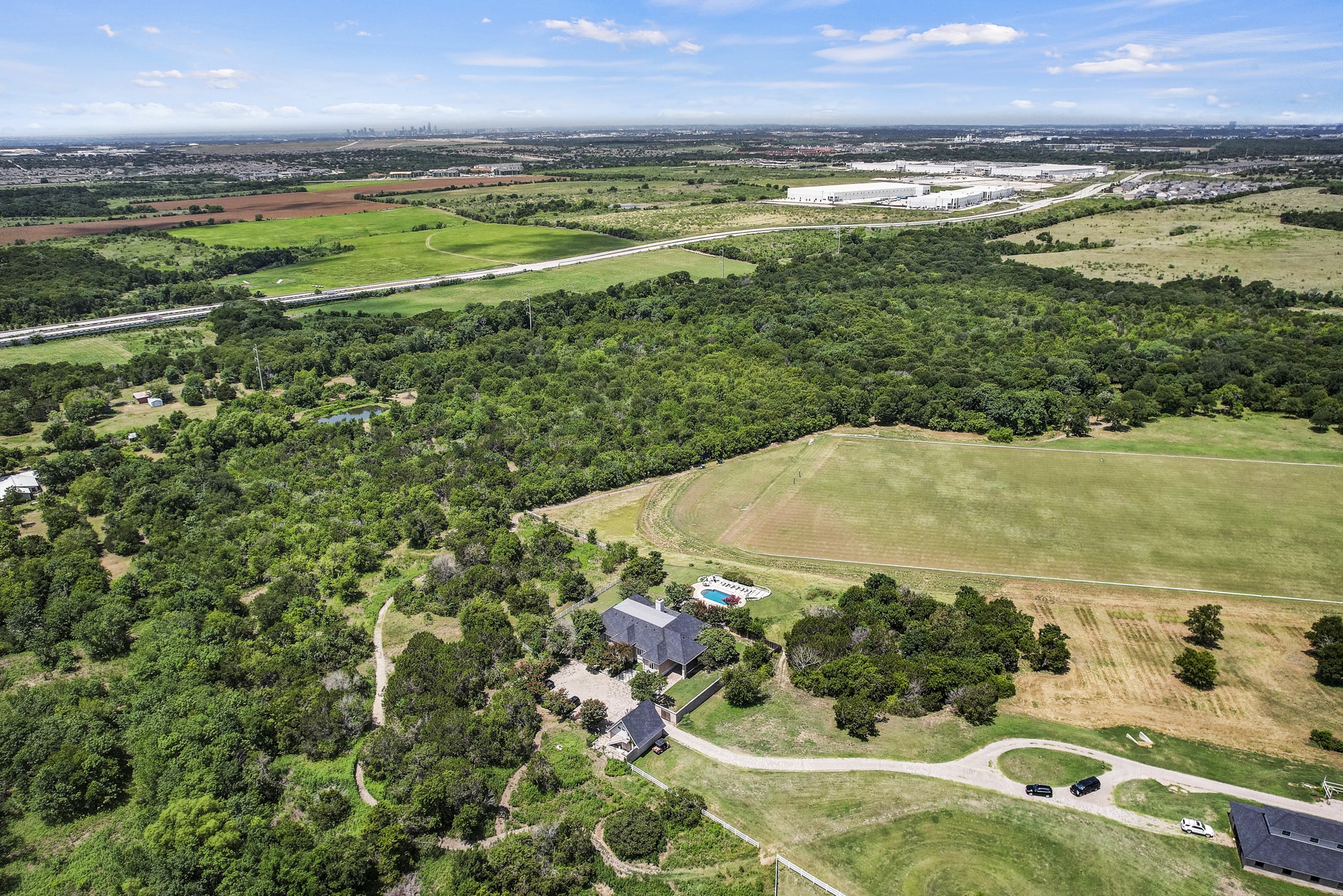 13628 Gregg Manor Road Manor, TX 78653 - Photo 4 of 33 a view of an ocean and a yard