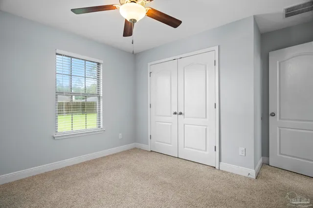 a view of a room with rack on the wall