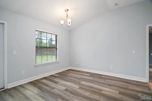 a kitchen with a sink stove and refrigerator