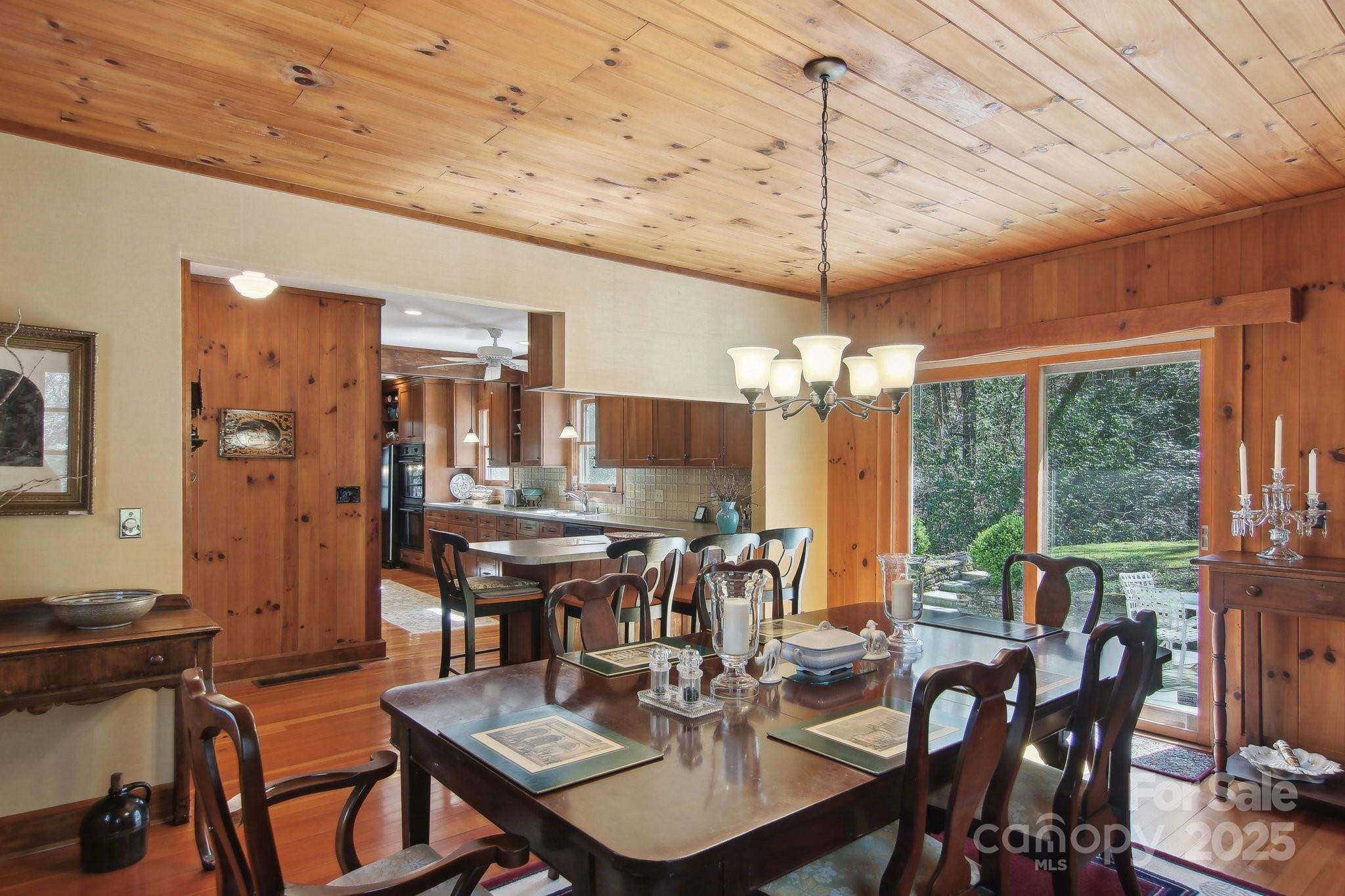 798 Evans Road Hendersonville, NC 28739 - Photo 13 of 45 a view of a dining room with furniture window and outside view