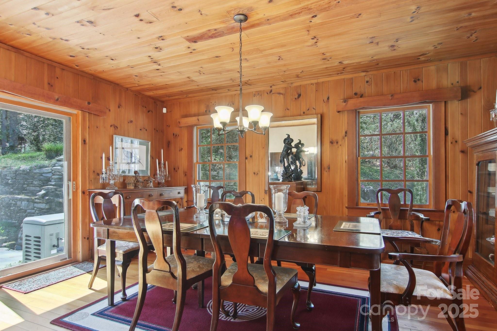 798 Evans Road Hendersonville, NC 28739 - Photo 14 of 45 a view of a dining room with furniture window and outside view