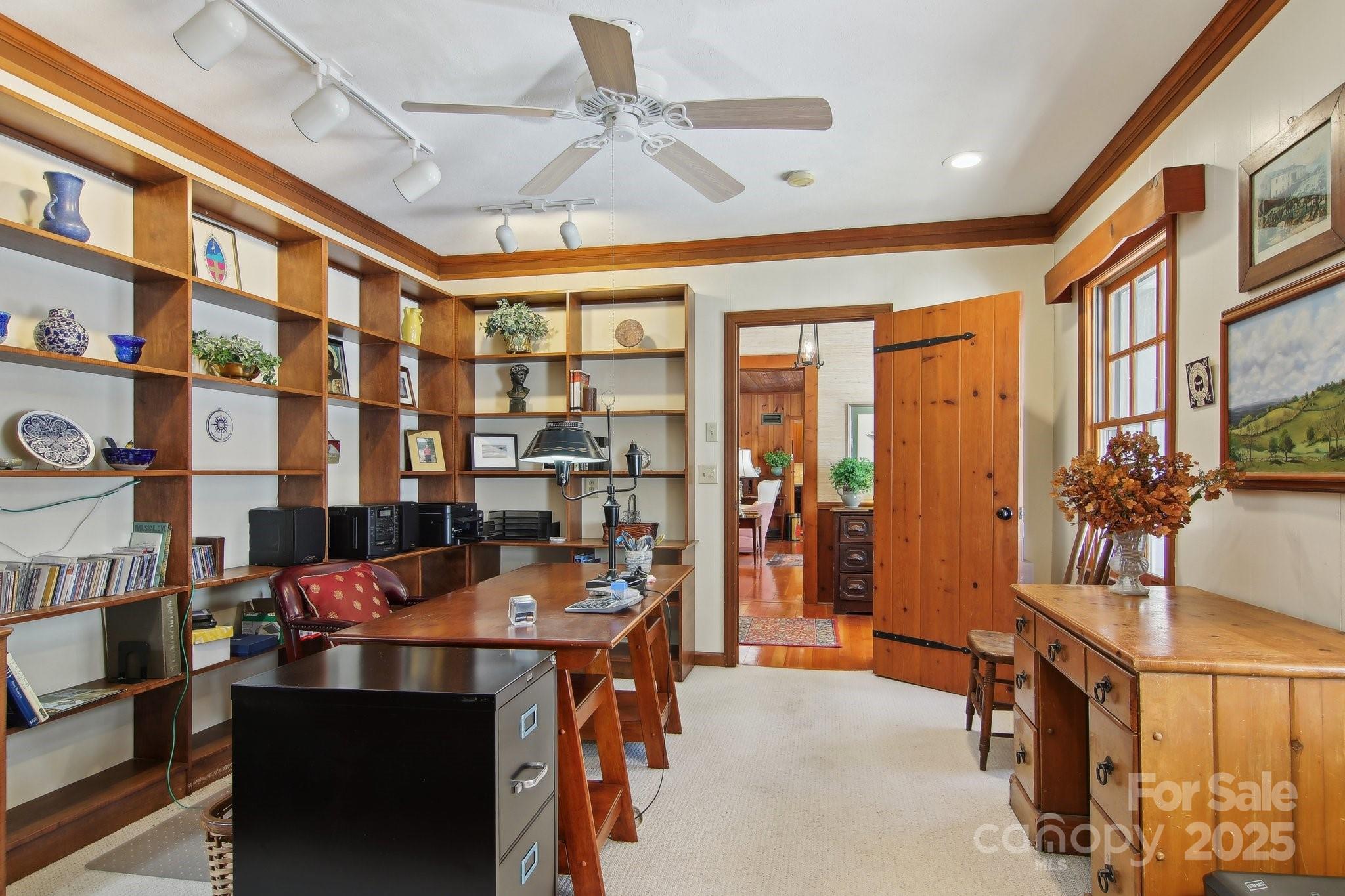 798 Evans Road Hendersonville, NC 28739 - Photo 16 of 45 a dining room with furniture and a chandelier
