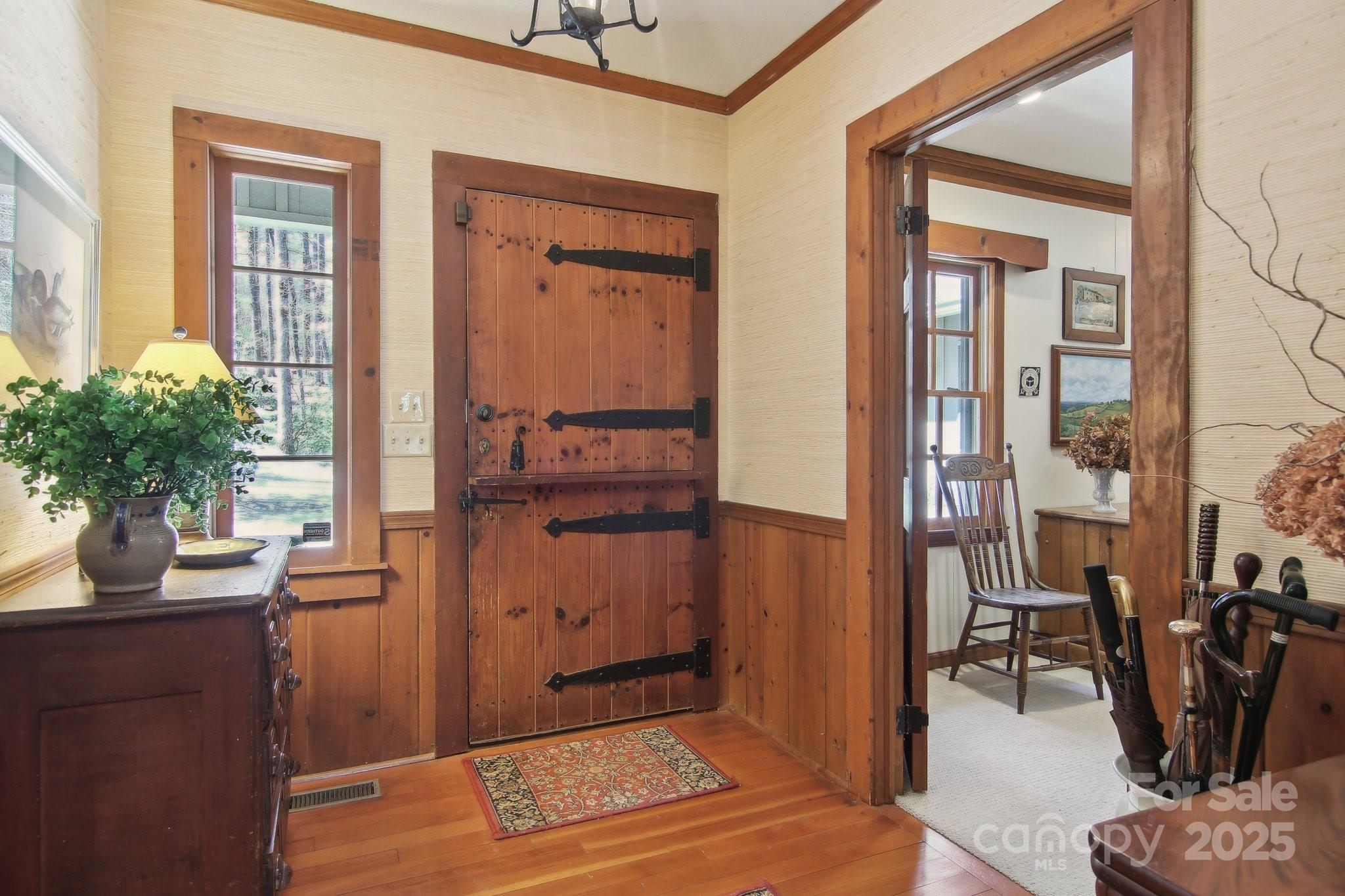 798 Evans Road Hendersonville, NC 28739 - Photo 2 of 45 a view of a livingroom with furniture and front door