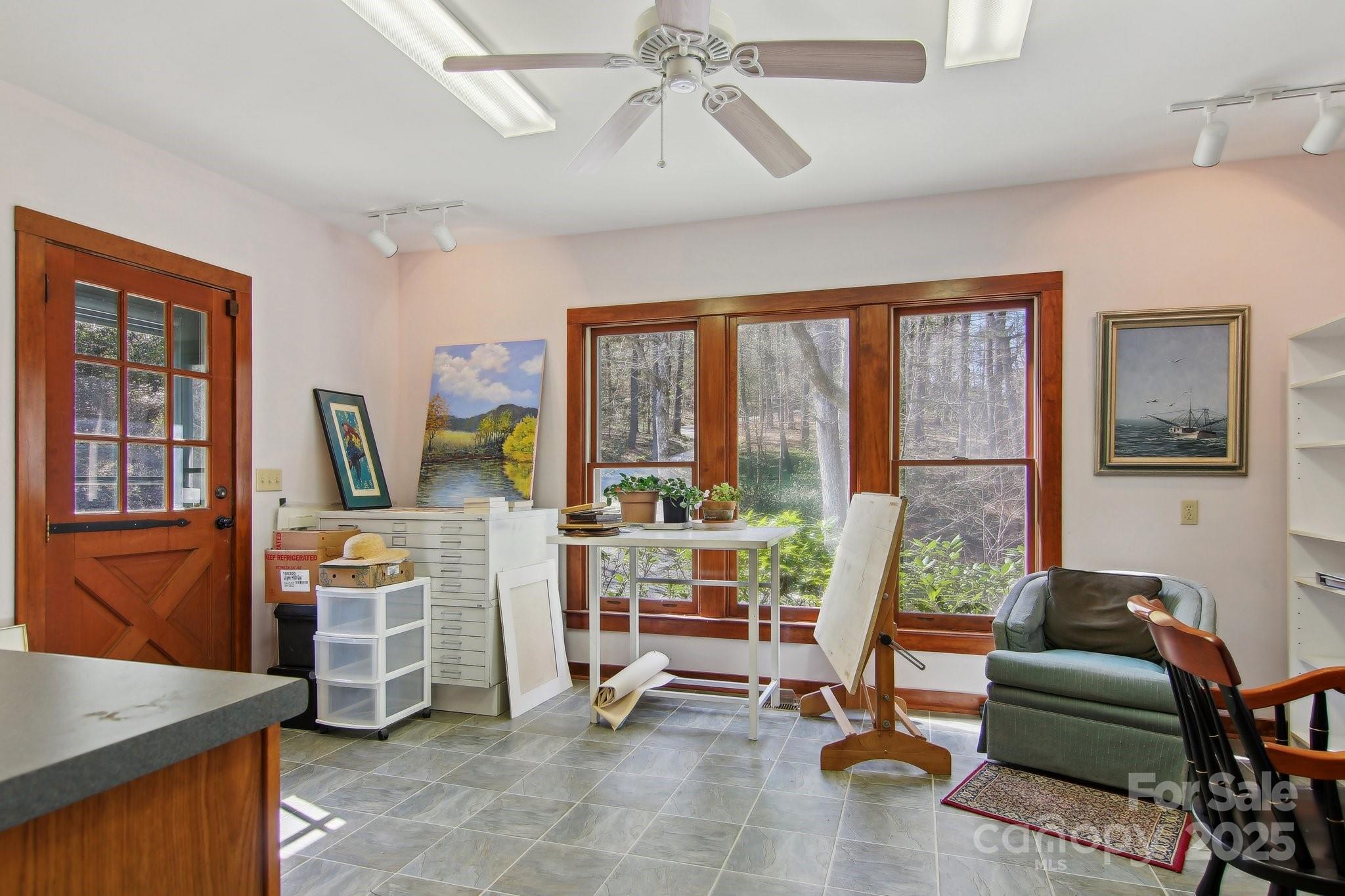 798 Evans Road Hendersonville, NC 28739 - Photo 27 of 45 a view of a livingroom with furniture window and outside view