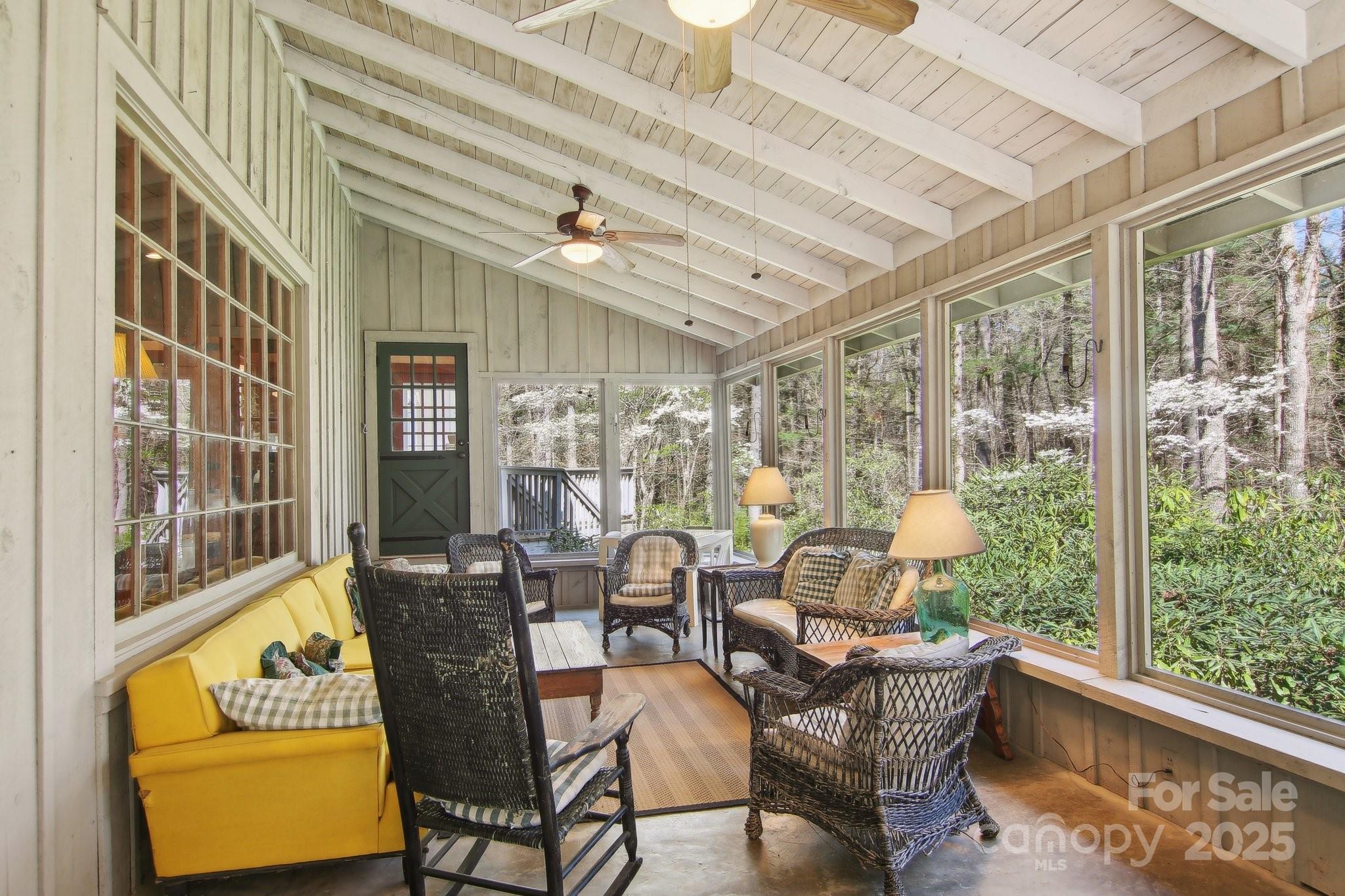 798 Evans Road Hendersonville, NC 28739 - Photo 28 of 45 a living room with furniture and a window