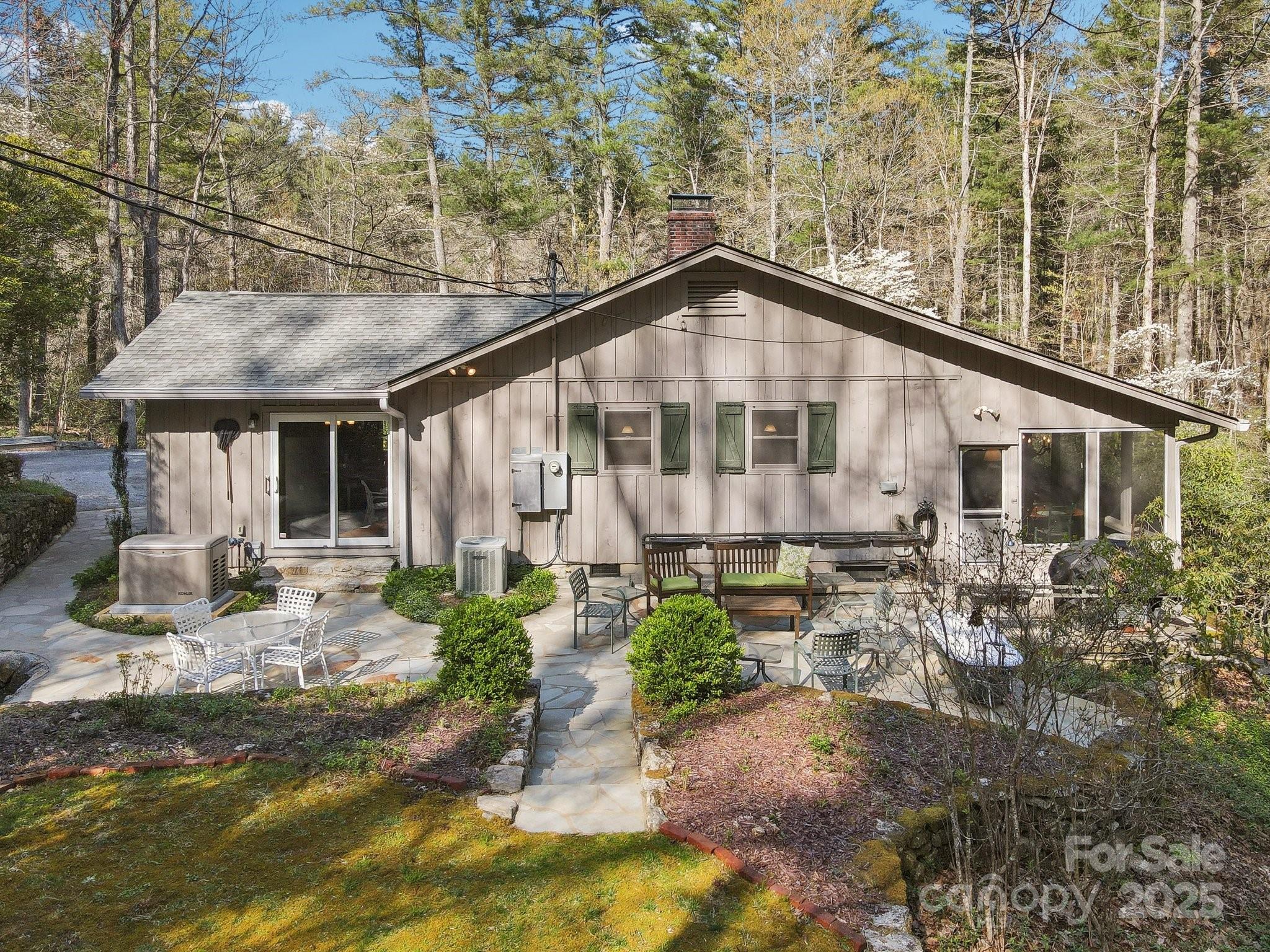 798 Evans Road Hendersonville, NC 28739 - Photo 36 of 45 a front view of a house with garden
