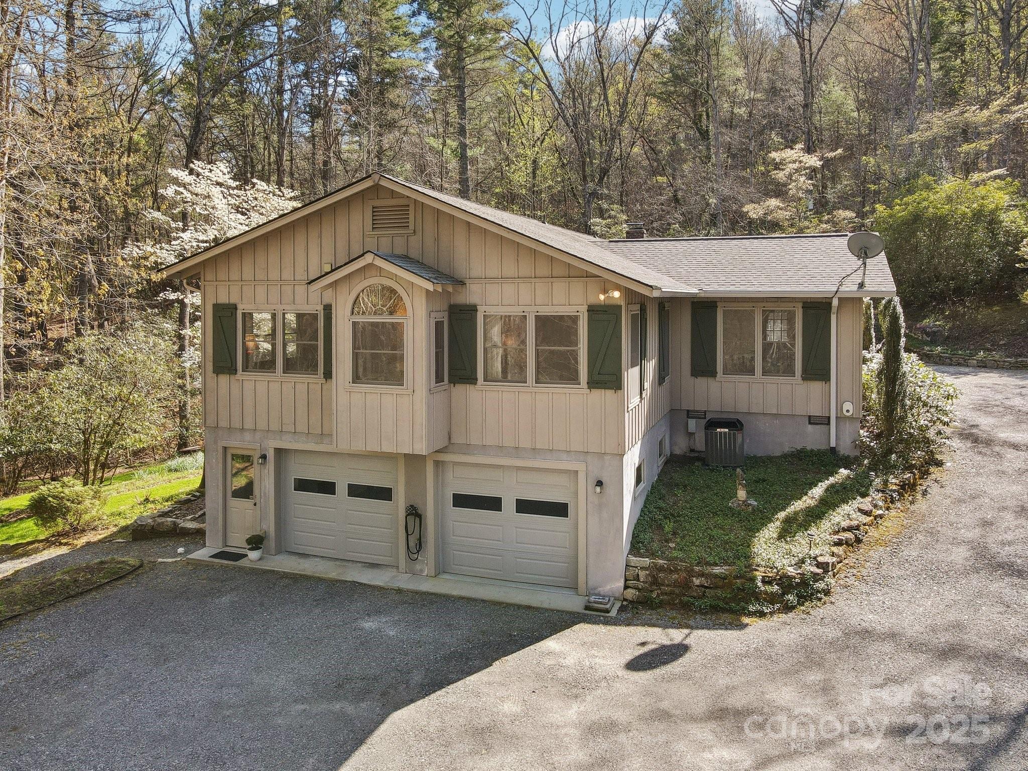 798 Evans Road Hendersonville, NC 28739 - Photo 37 of 45 a front view of a house with a yard