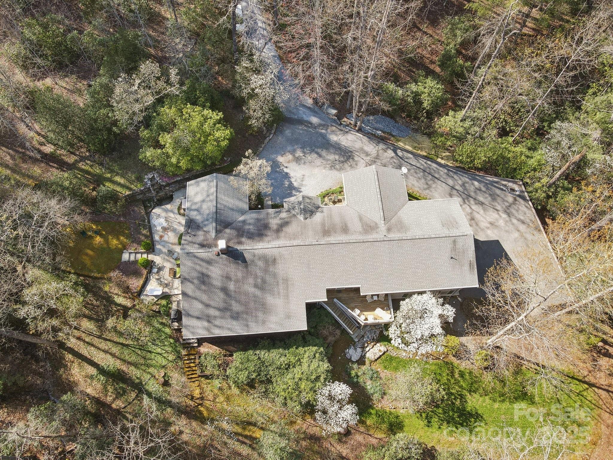 798 Evans Road Hendersonville, NC 28739 - Photo 40 of 45 a view of a house with a yard